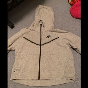 Woman’s Nike Tech size medium. Never worn but no tags.